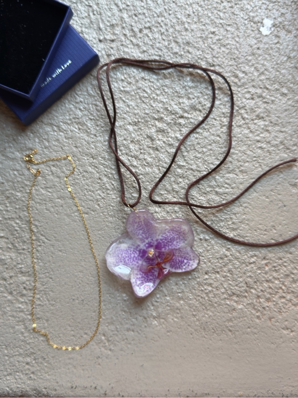 Handmade Purple Orchid Resin Pendant Necklace with Brown Cord and gold chain